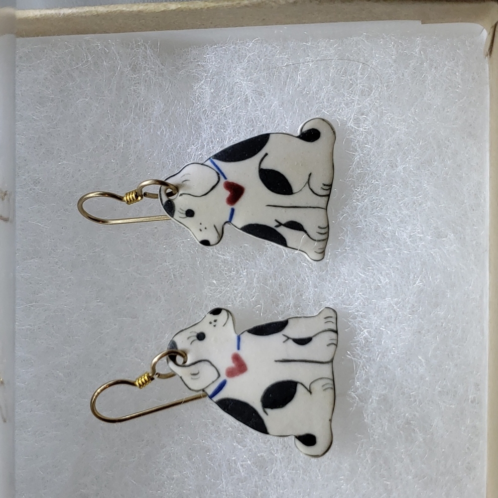 Dog with heart earrings